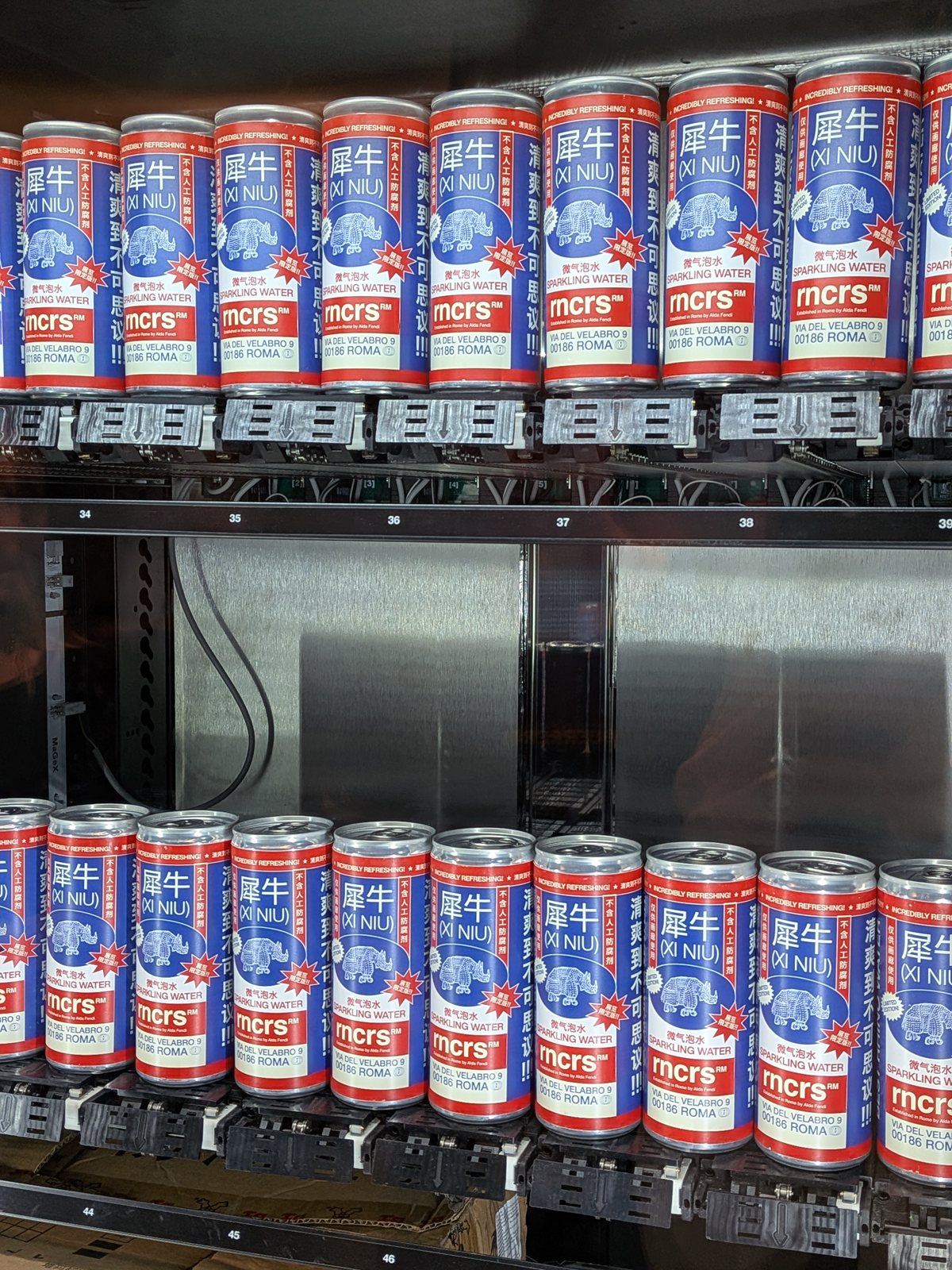 Cans stocked in the gallery vending machine