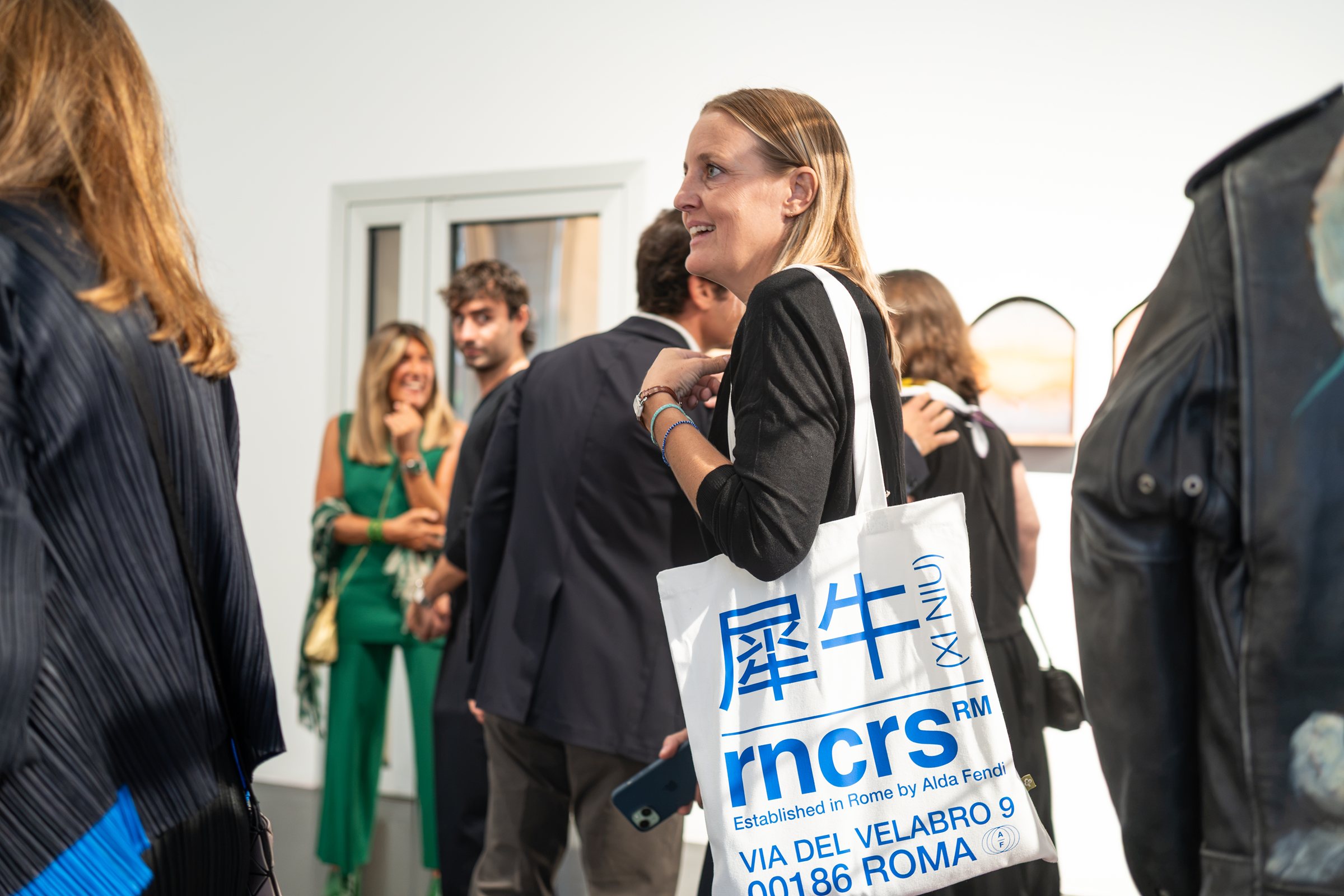 Xi Niu tote bag at the opening